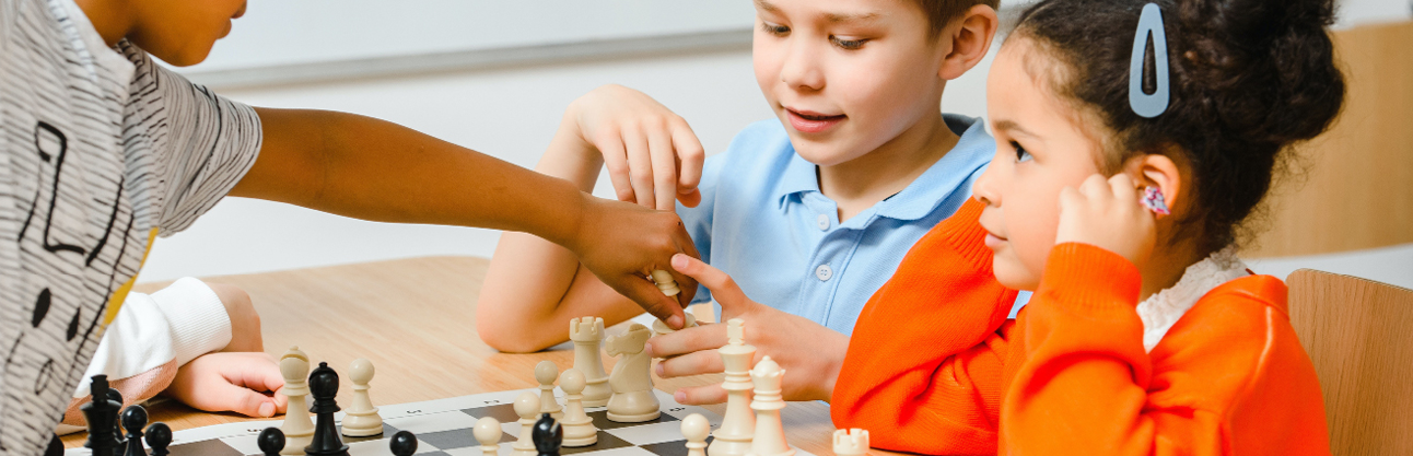 A group of children playing chess.