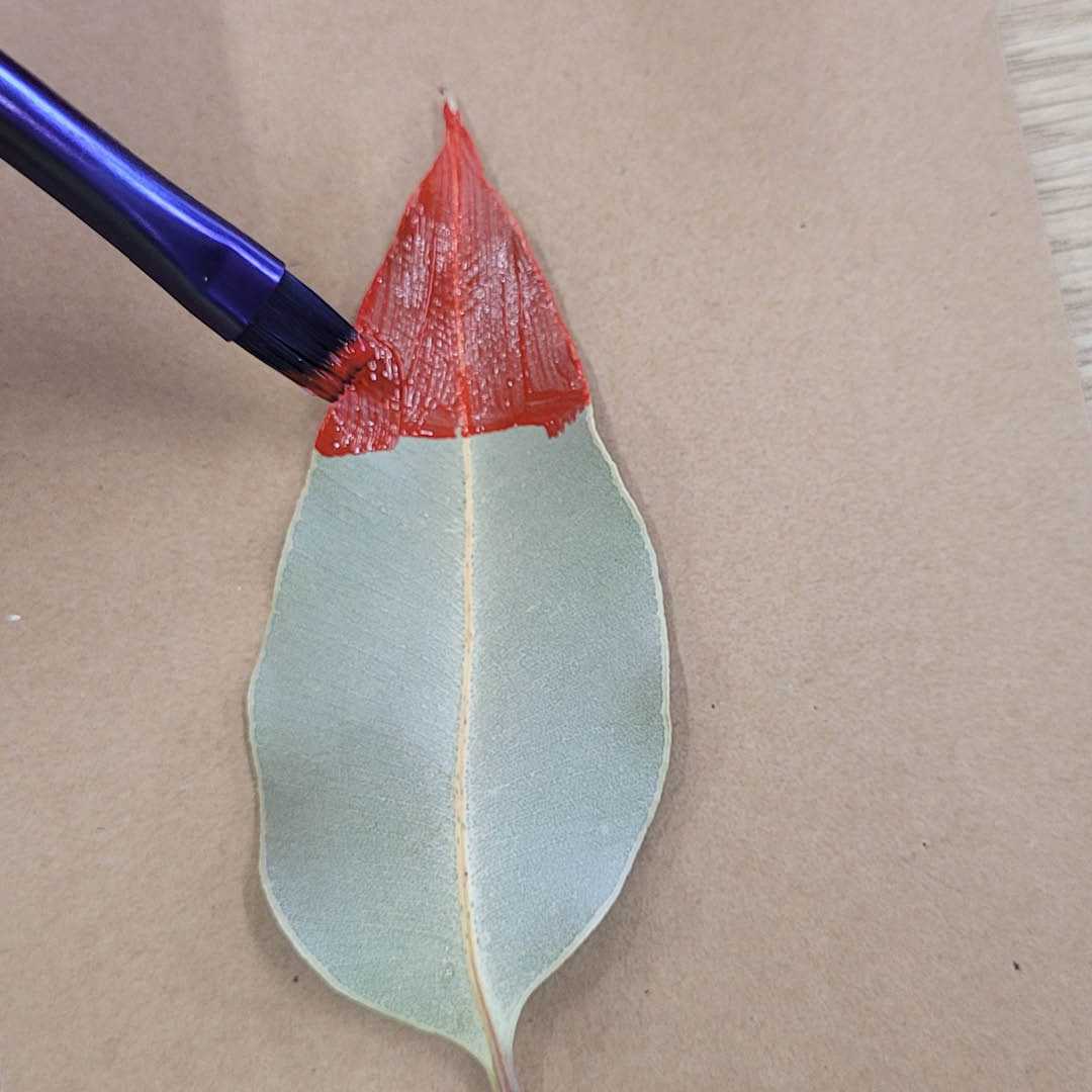 Painting the red tip for the Santa hat.